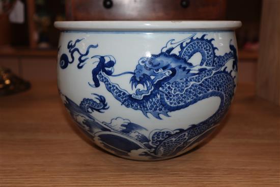 A Chinese blue and white dragon jardiniere height 16cm